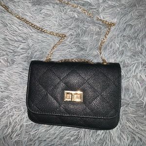 Black bag with gold chain